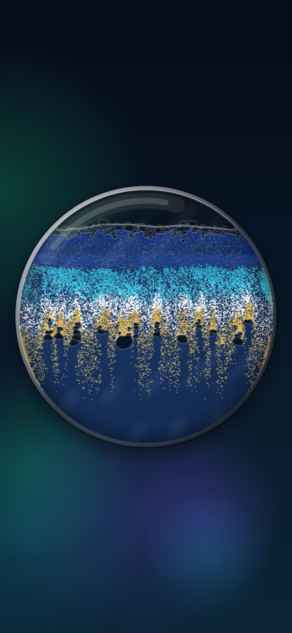 Deep Sea Blue sand settled into layers inside the round glass